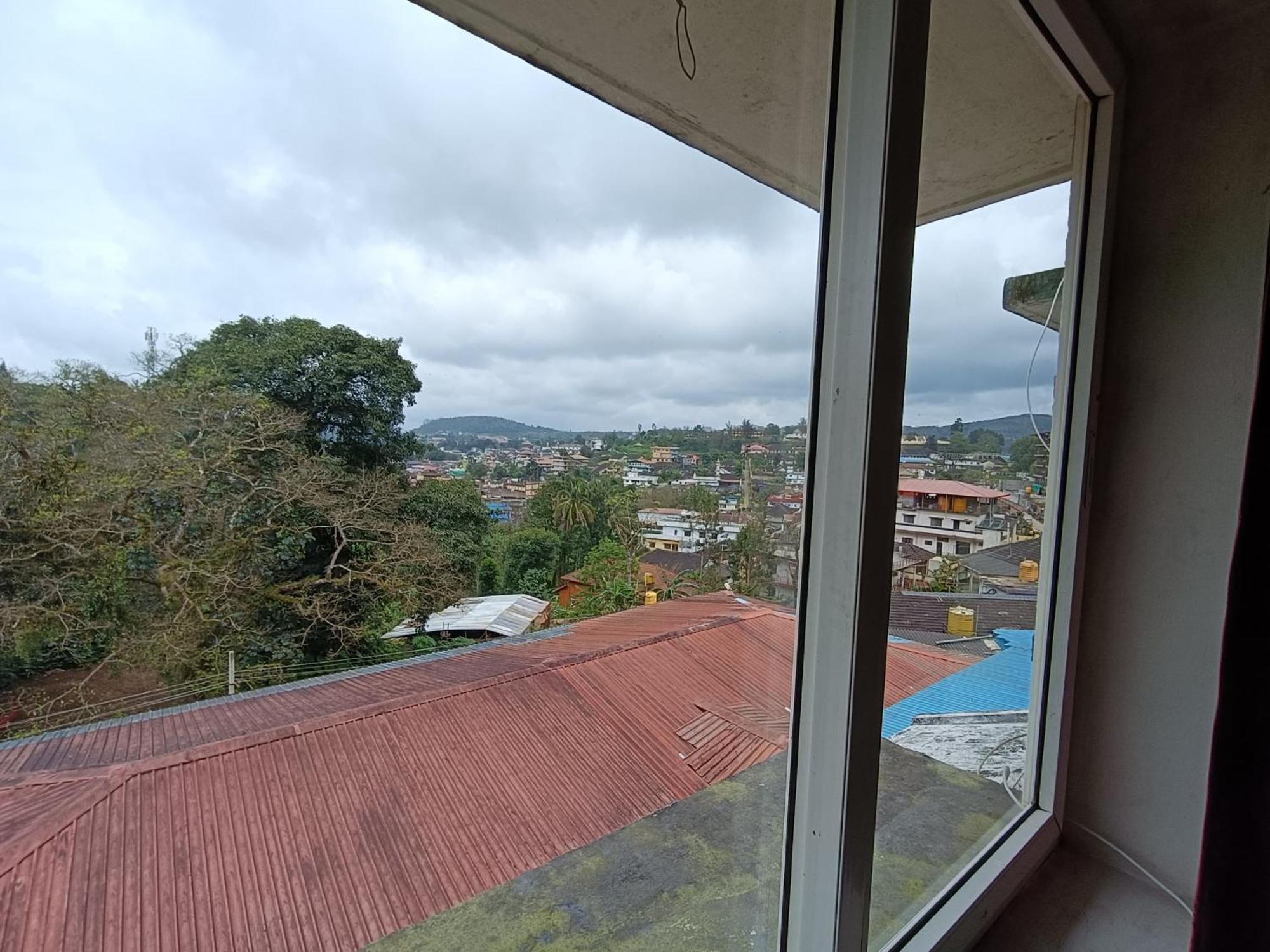 Hotel New Rajdarshan Madikeri Kültér fotó