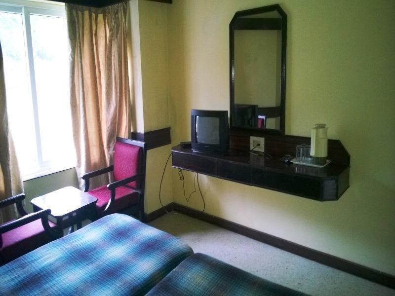 Hotel New Rajdarshan Madikeri Kültér fotó