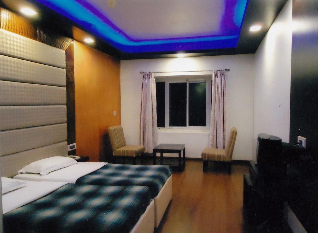 Hotel New Rajdarshan Madikeri Kültér fotó